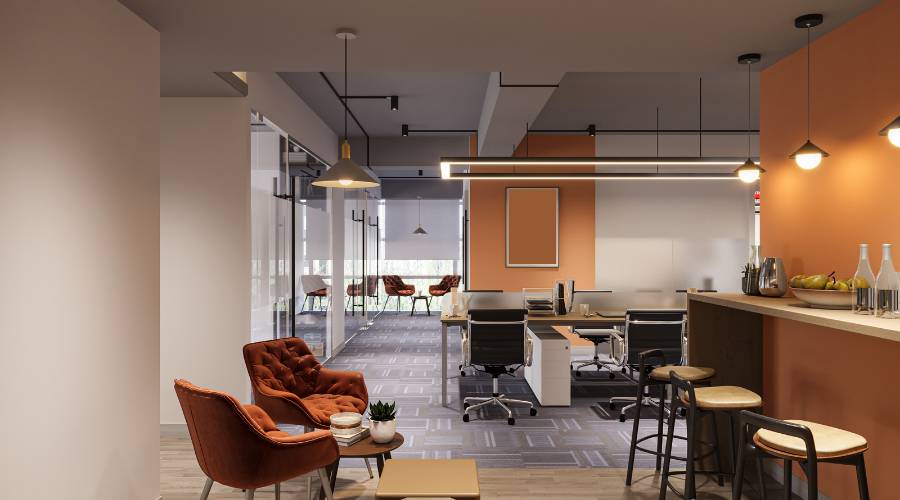 Modern office with orange accents and seating area